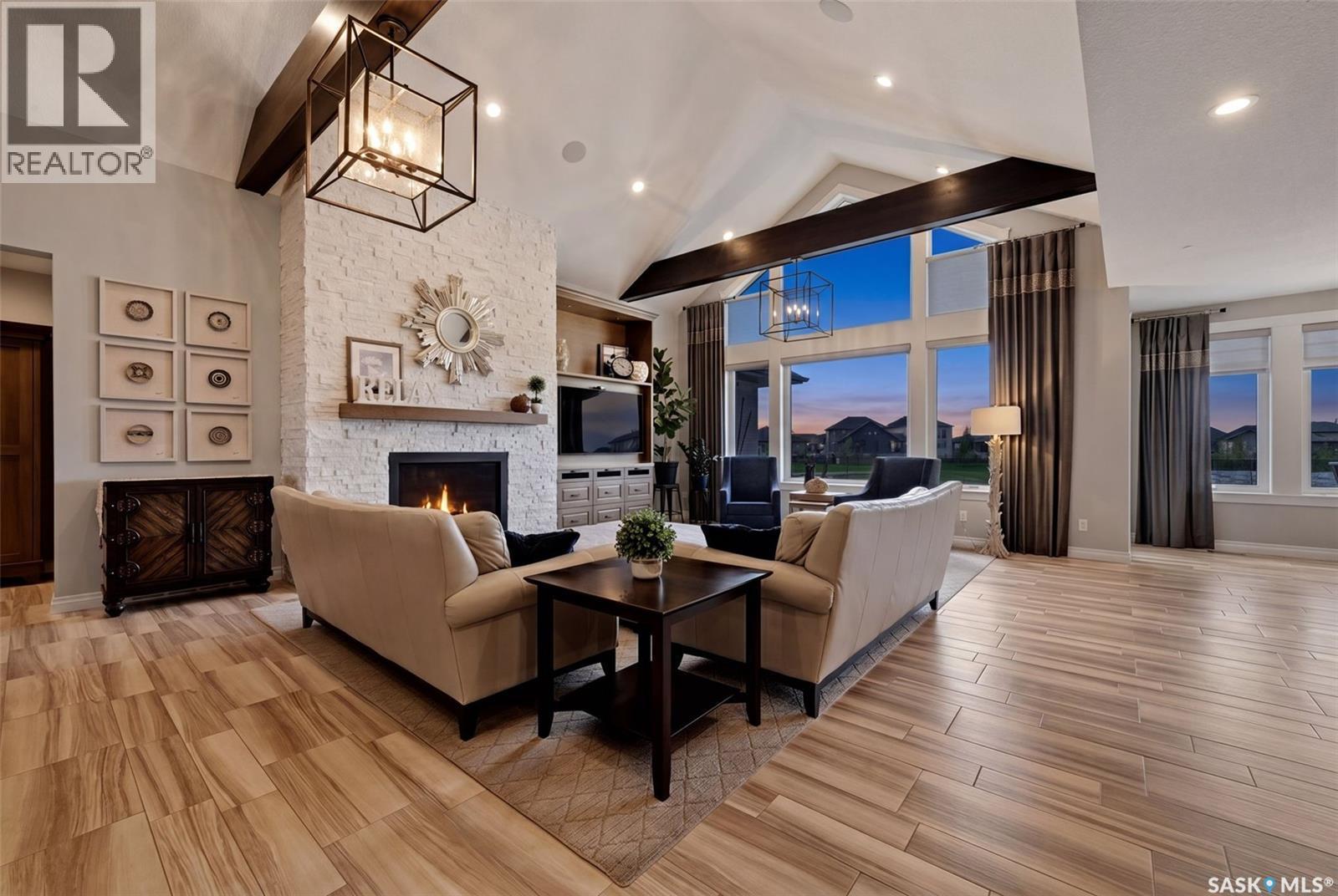 3505 Green Brook Road, Regina, SK - Indoor Photo Showing Living Room With Fireplace