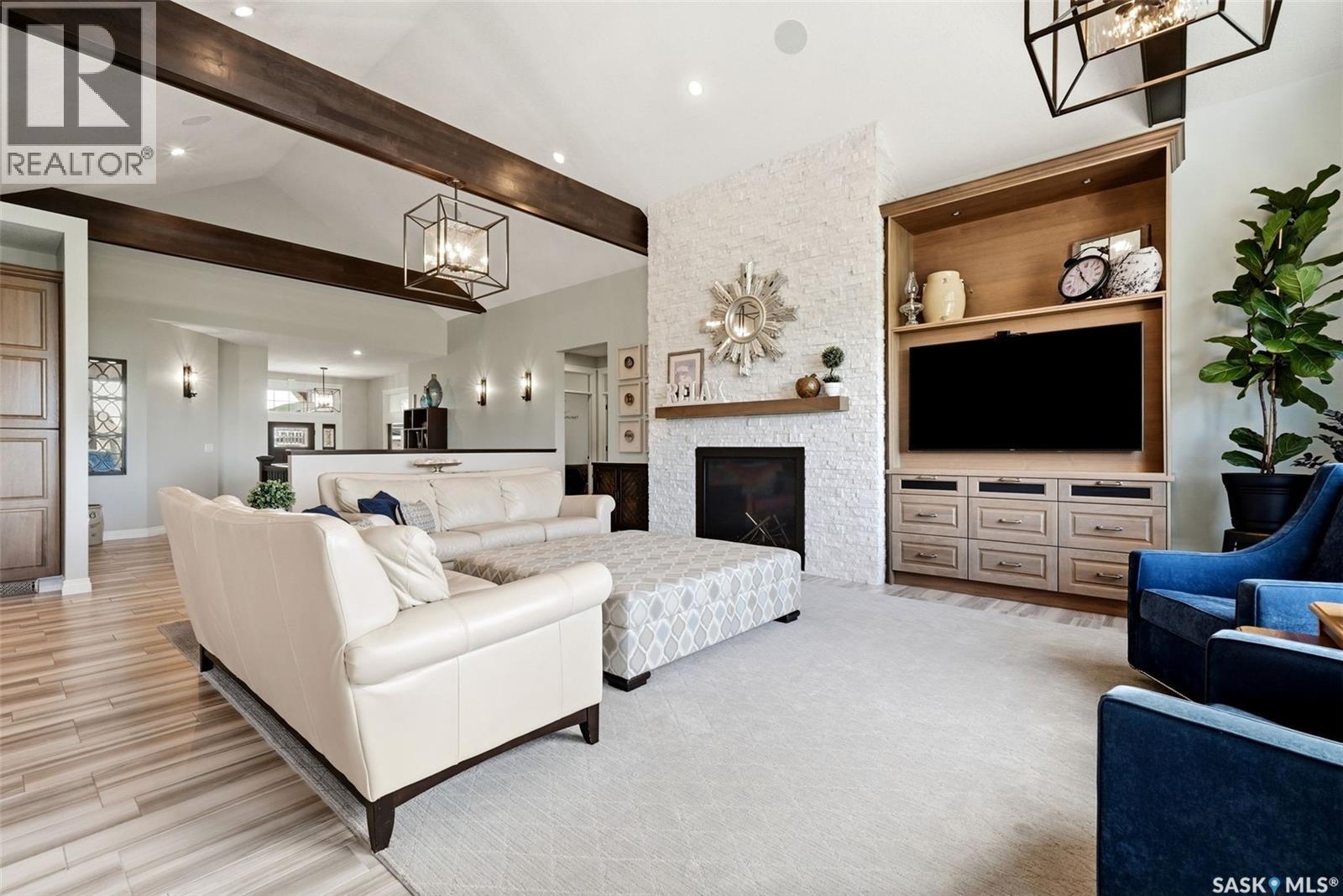 3505 Green Brook Road, Regina, SK - Indoor Photo Showing Living Room With Fireplace