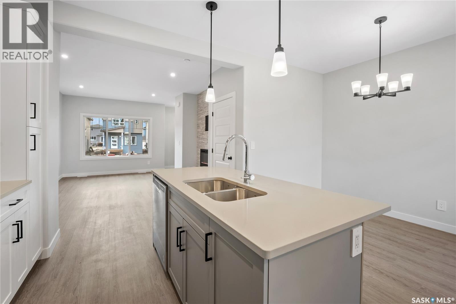 2960 Green Turtle Road, Regina, SK - Indoor Photo Showing Kitchen With Double Sink