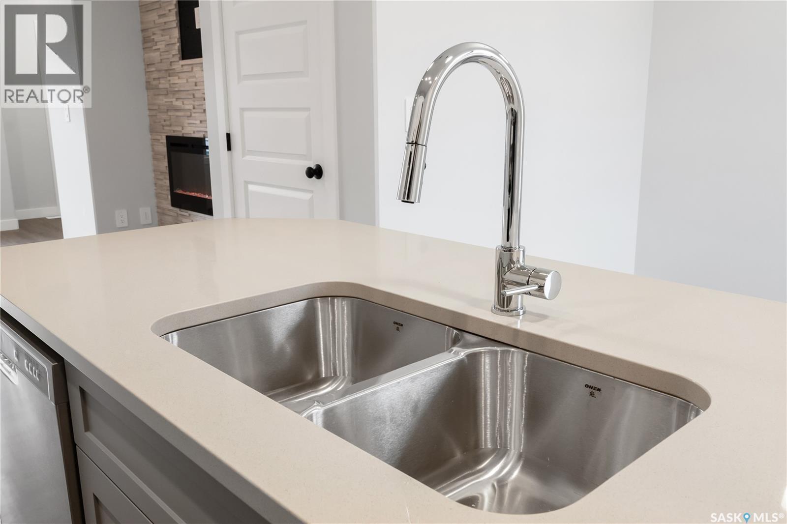 2960 Green Turtle Road, Regina, SK - Indoor Photo Showing Kitchen With Double Sink