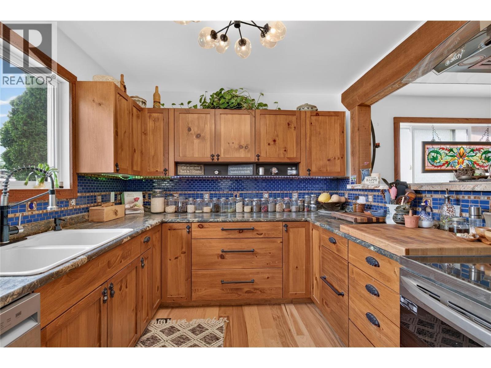 6415 Glendora Way, Coldstream, BC - Indoor Photo Showing Kitchen With Double Sink