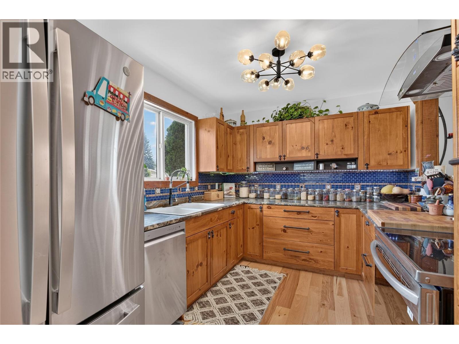 6415 Glendora Way, Coldstream, BC - Indoor Photo Showing Kitchen With Double Sink