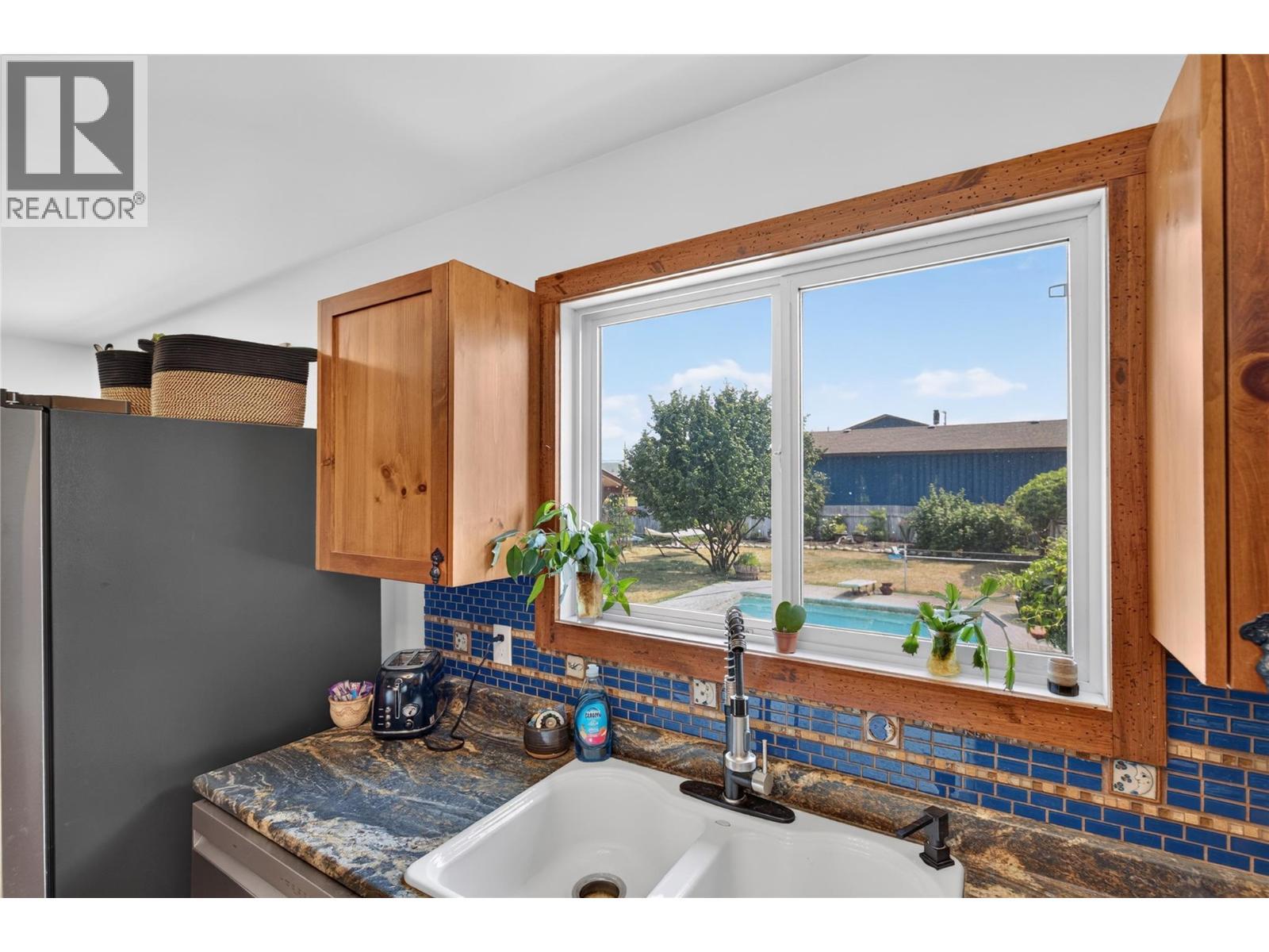 6415 Glendora Way, Coldstream, BC - Indoor Photo Showing Kitchen With Double Sink