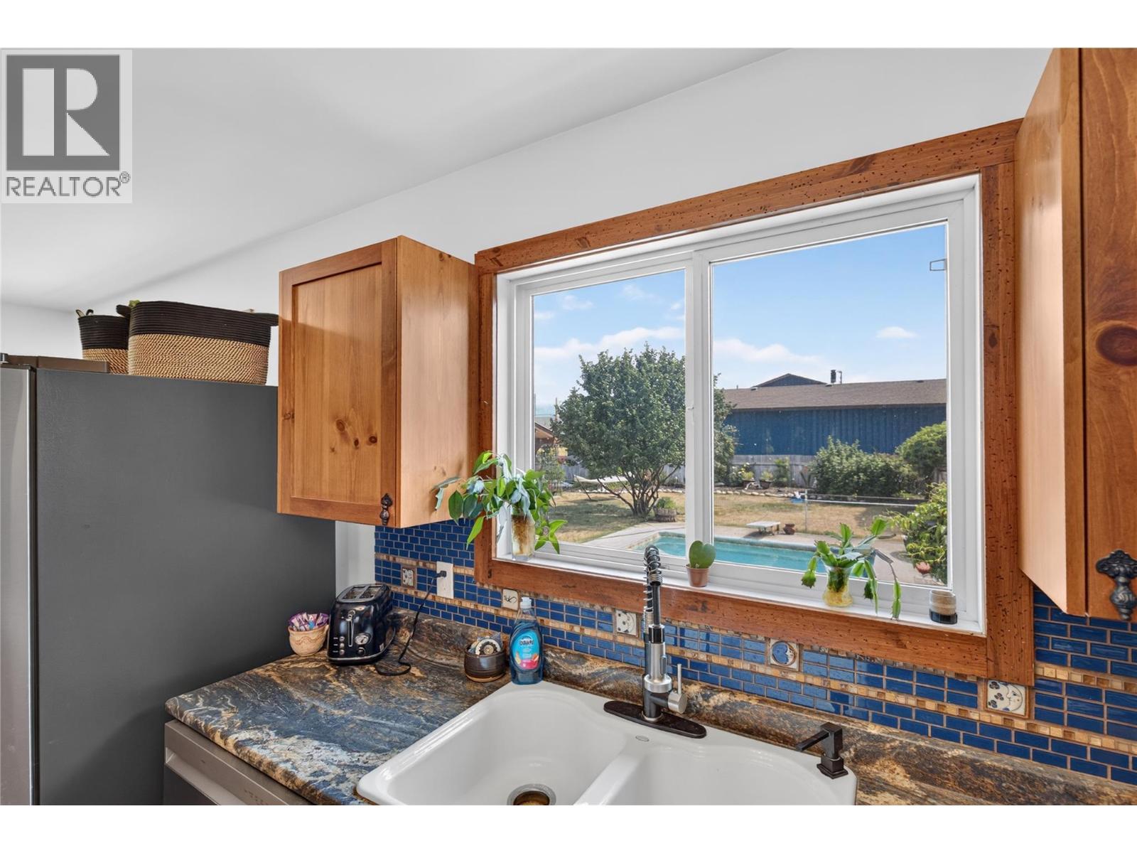 6415 Glendora Way, Coldstream, BC - Indoor Photo Showing Kitchen With Double Sink