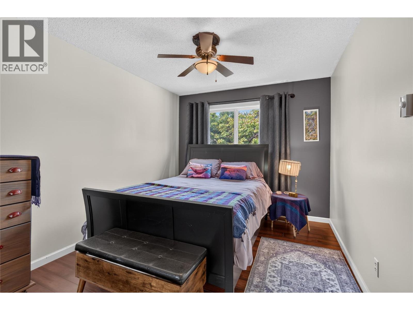 Upper floor Bedroom - 6415 Glendora Way, Coldstream, BC - Indoor Photo Showing Bedroom