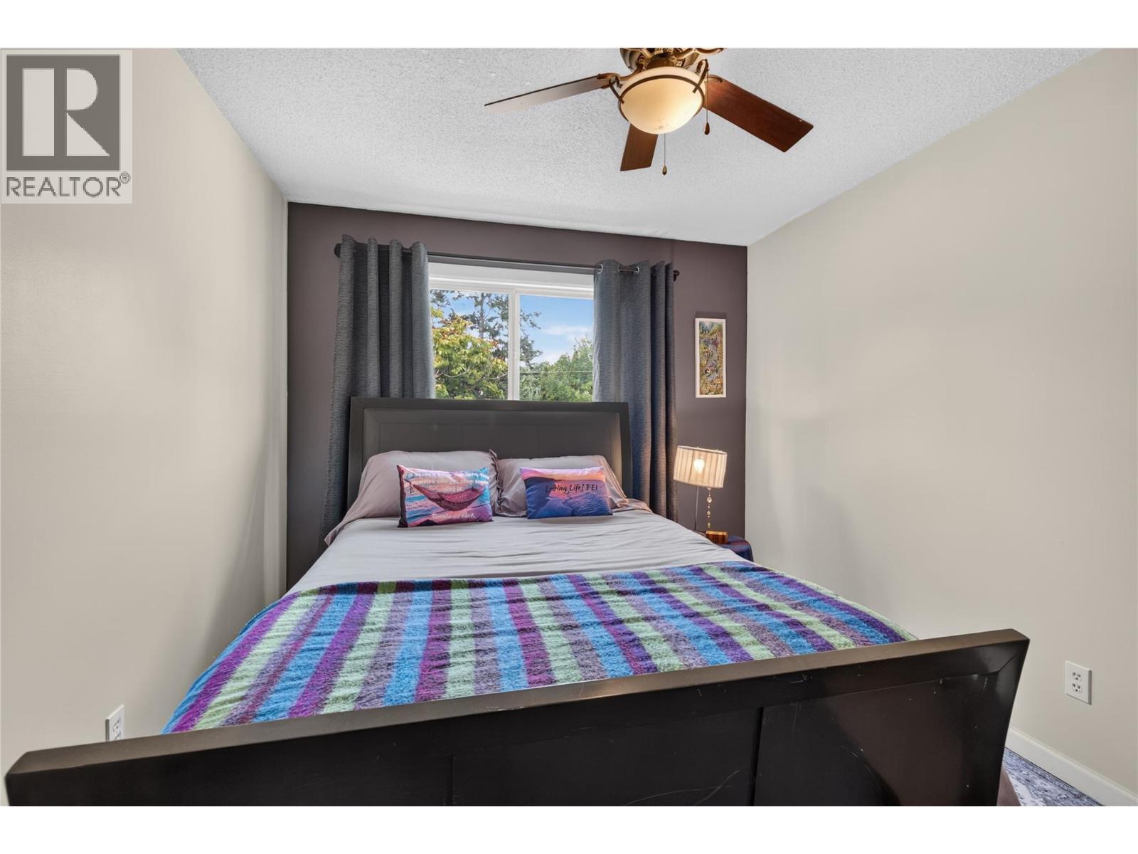 6415 Glendora Way, Coldstream, BC - Indoor Photo Showing Bedroom