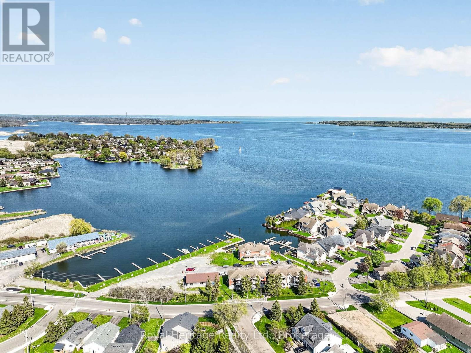 32 Edgewater Drive, Brighton, ON - Outdoor With Body Of Water With View