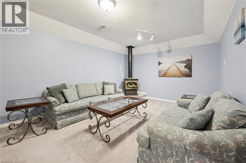Sitting area and 2nd gas fireplace. - 187 Westchester Drive, Kitchener, ON - Indoor Photo Showing Living Room With Fireplace