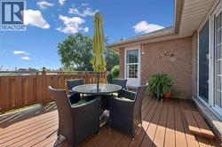 Spacious outdoor deck with privacy fence -