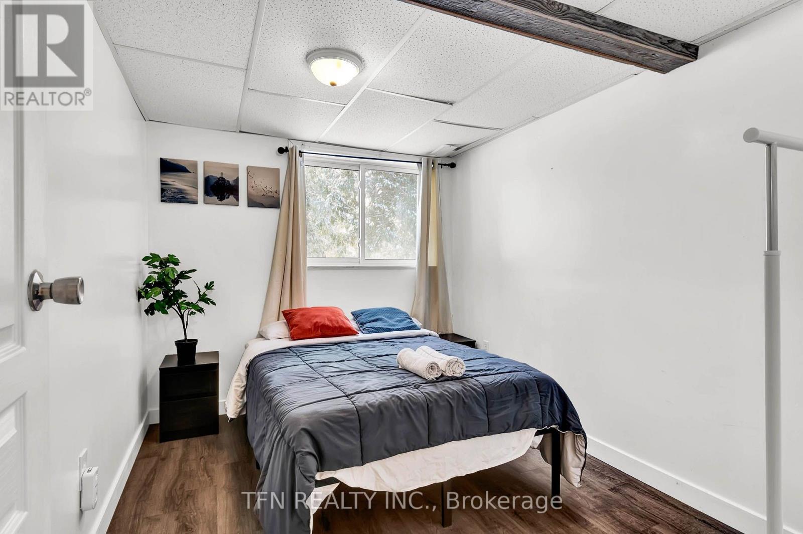 322 Concession Road W, Tiny, ON - Indoor Photo Showing Bedroom
