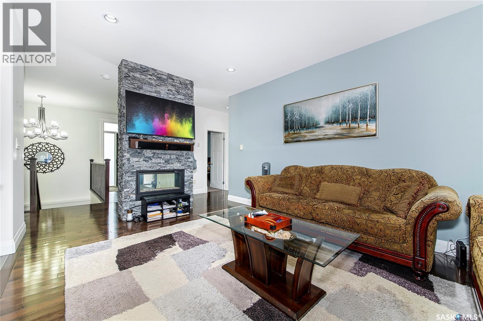 733 Gowan Road, Warman, SK - Indoor Photo Showing Living Room With Fireplace
