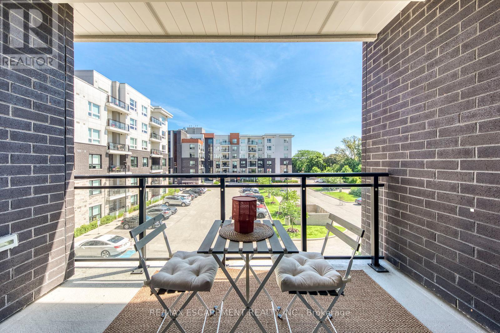 303 - 320 Plains Road E, Burlington, ON - Outdoor With Balcony