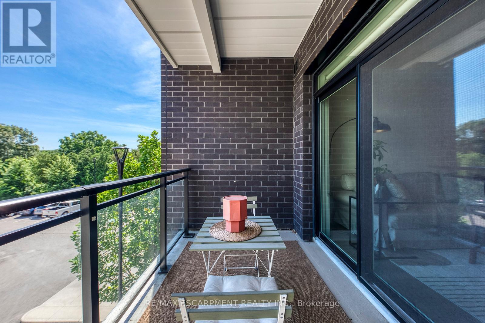 303 - 320 Plains Road E, Burlington, ON - Outdoor With Balcony With Exterior