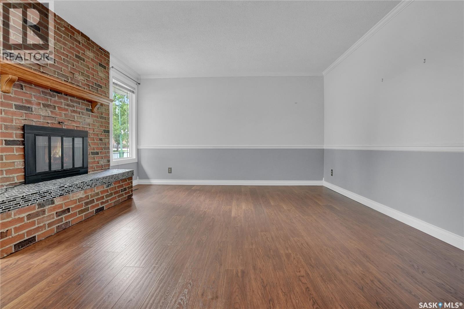 6015 7Th Avenue N, Regina, SK - Indoor With Fireplace