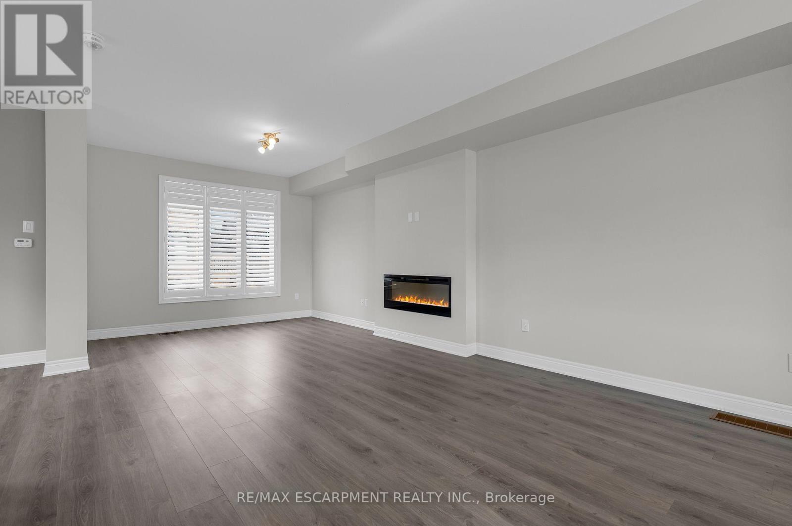 2 Waterview Lane, Grimsby, ON - Indoor Photo Showing Other Room With Fireplace