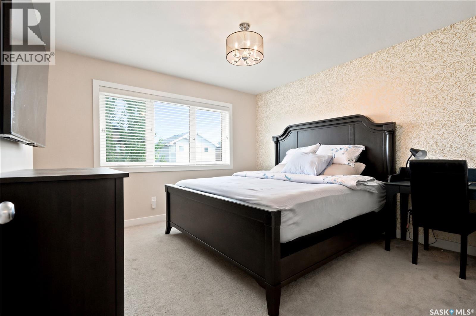 207 Kolynchuk Manor, Saskatoon, SK - Indoor Photo Showing Bedroom