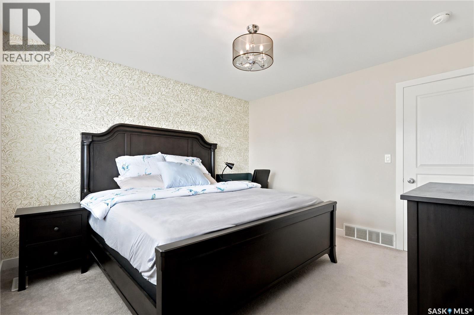 207 Kolynchuk Manor, Saskatoon, SK - Indoor Photo Showing Bedroom