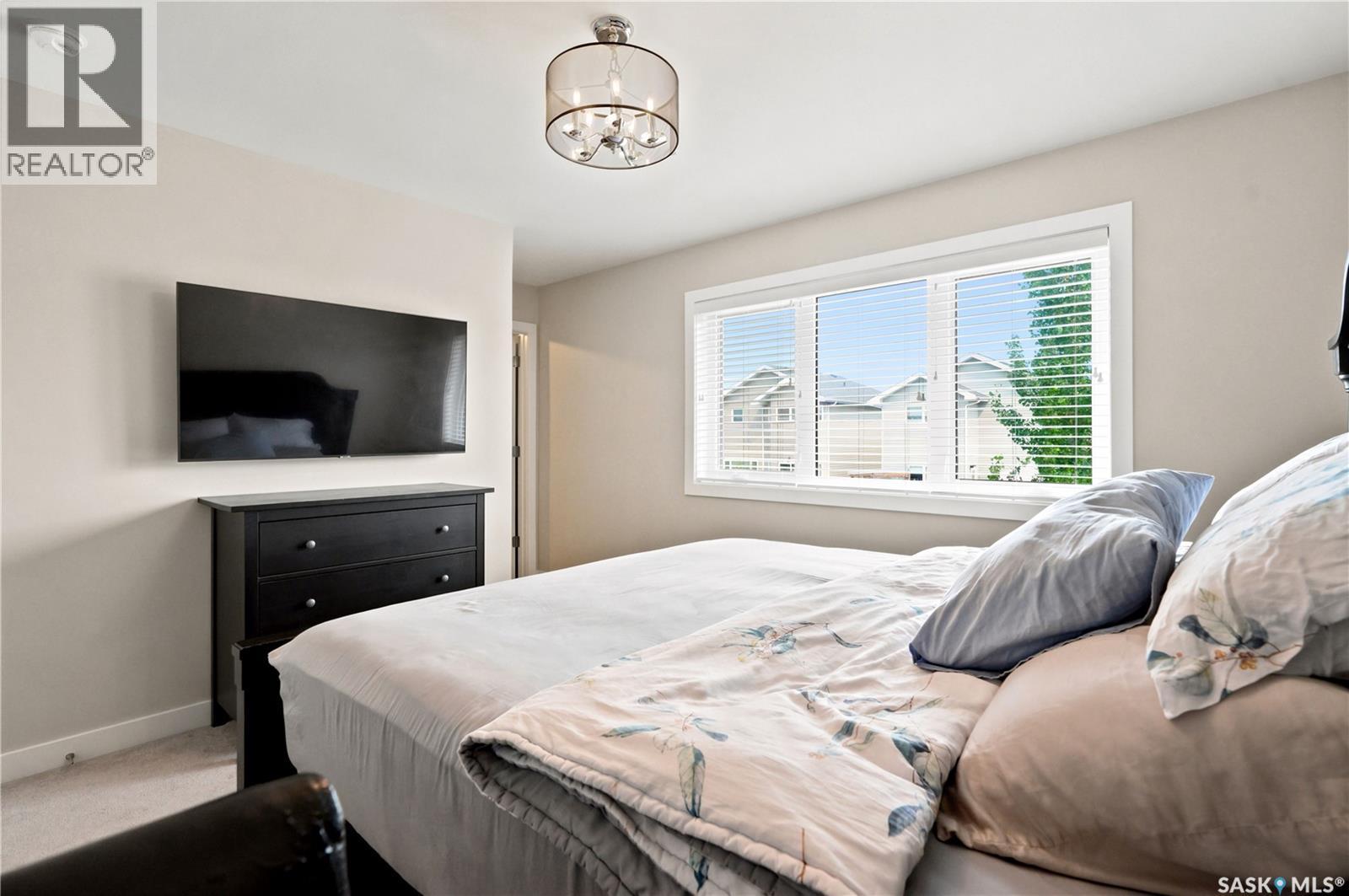 207 Kolynchuk Manor, Saskatoon, SK - Indoor Photo Showing Bedroom