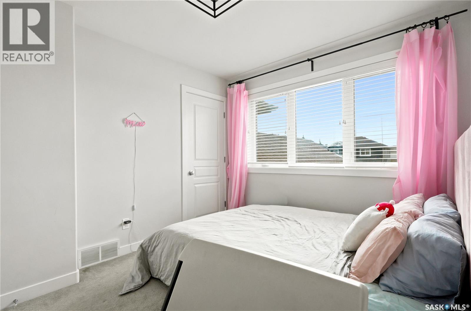 207 Kolynchuk Manor, Saskatoon, SK - Indoor Photo Showing Bedroom