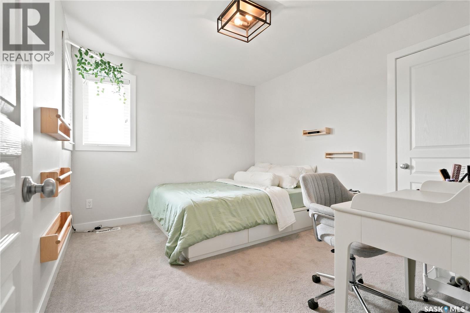 207 Kolynchuk Manor, Saskatoon, SK - Indoor Photo Showing Bedroom