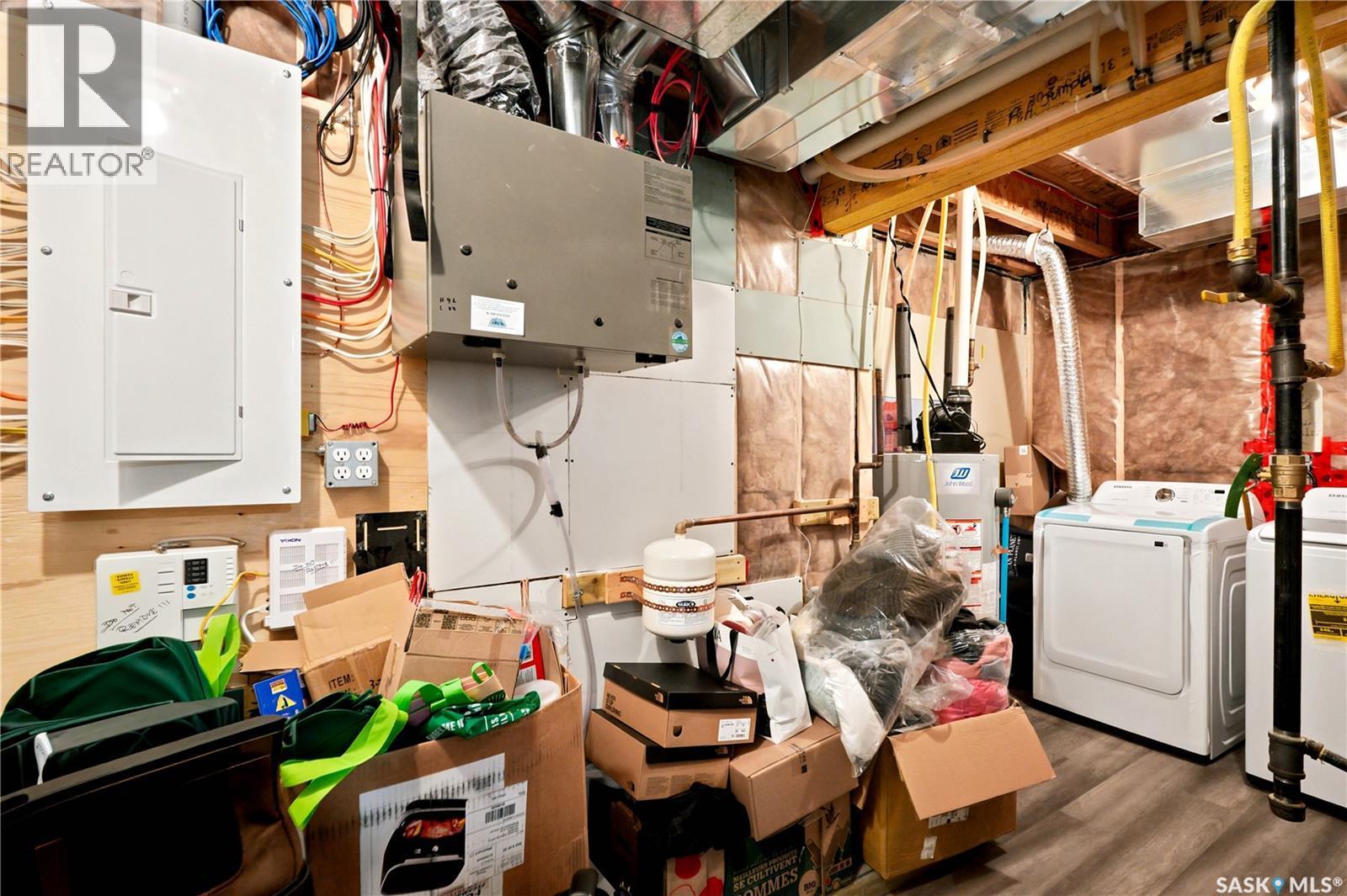 207 Kolynchuk Manor, Saskatoon, SK - Indoor Photo Showing Laundry Room