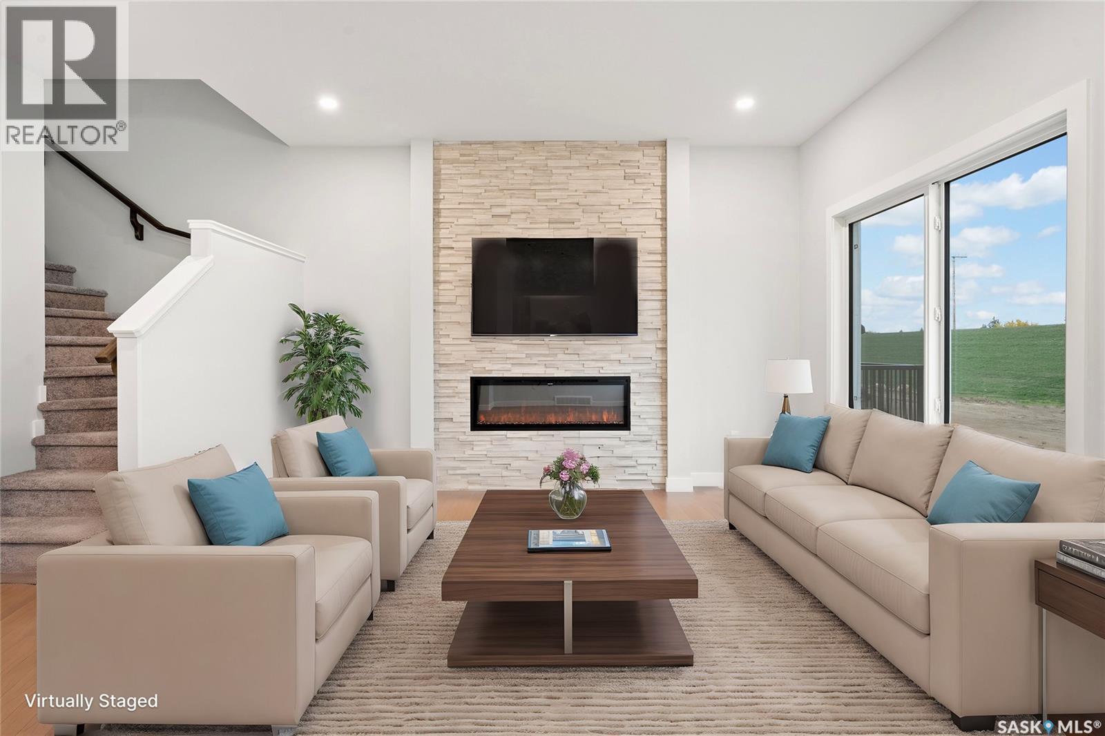 2921 Green Turtle Road, Regina, SK - Indoor Photo Showing Living Room With Fireplace