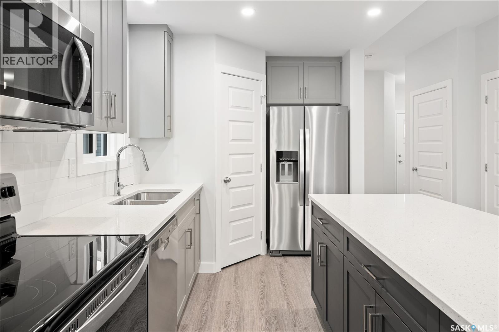 2921 Green Turtle Road, Regina, SK - Indoor Photo Showing Kitchen With Double Sink With Upgraded Kitchen