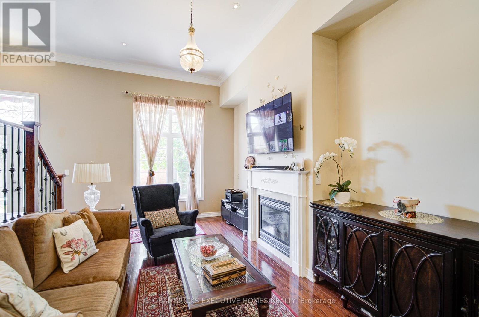 3885 Eglinton Avenue, Mississauga, ON - Indoor Photo Showing Living Room With Fireplace