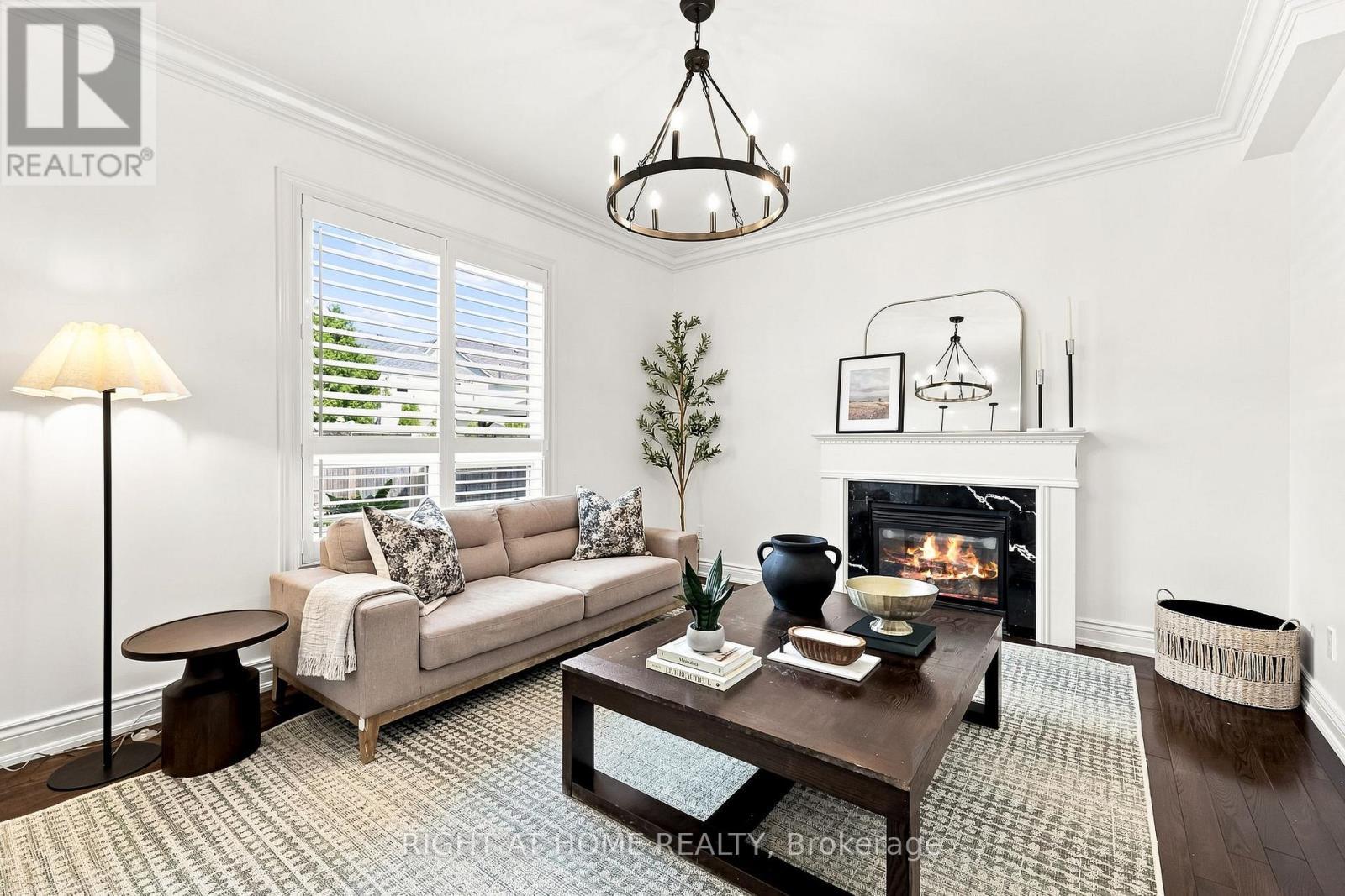 179 Cachet Boulevard, Whitby, ON - Indoor Photo Showing Living Room With Fireplace
