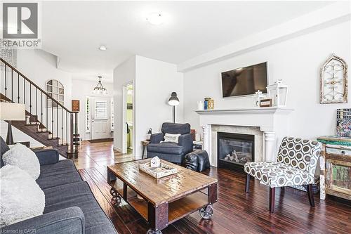 32 Dulgaren Street, Hamilton, ON - Indoor Photo Showing Living Room With Fireplace