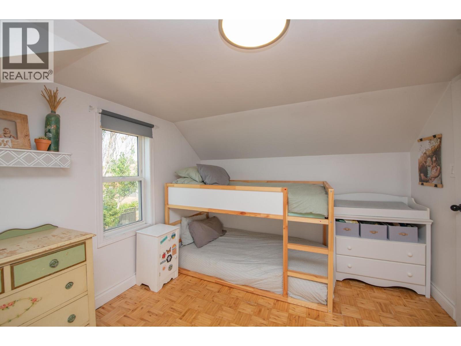 Second Bedroom on the 2nd floor - 9211 6 Highway, Coldstream, BC - Indoor Photo Showing Bedroom