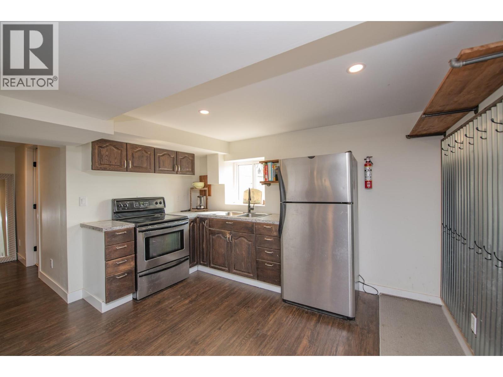 9211 6 Highway, Coldstream, BC - Indoor Photo Showing Kitchen With Double Sink