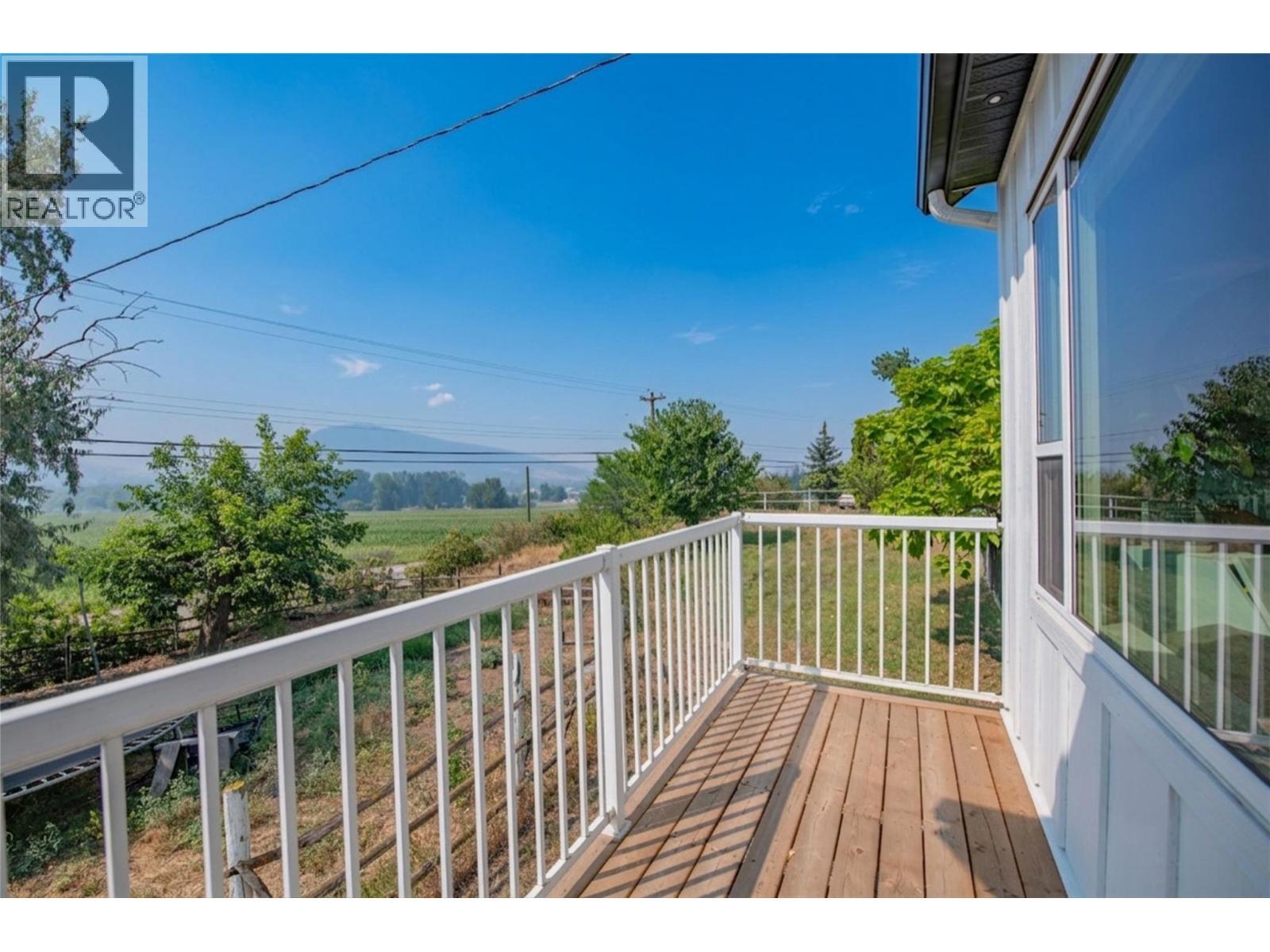 9211 6 Highway, Coldstream, BC - Outdoor With Deck Patio Veranda With Exterior