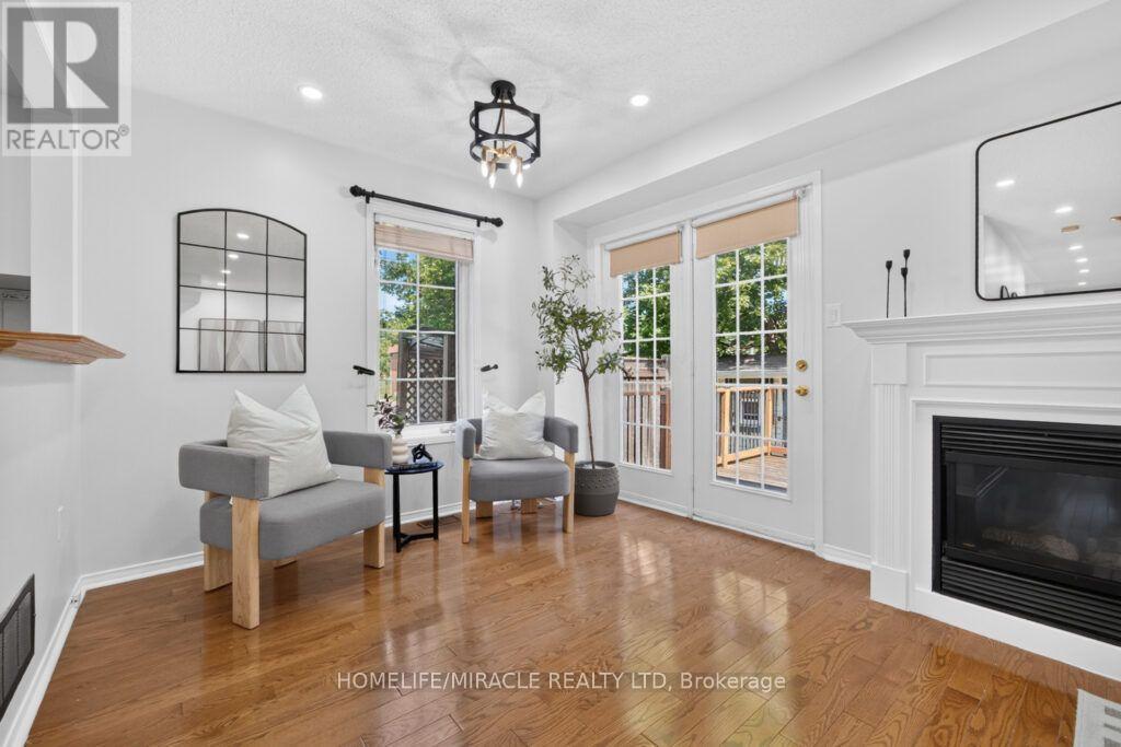59 Dawson Crescent, Milton, ON - Indoor Photo Showing Living Room With Fireplace
