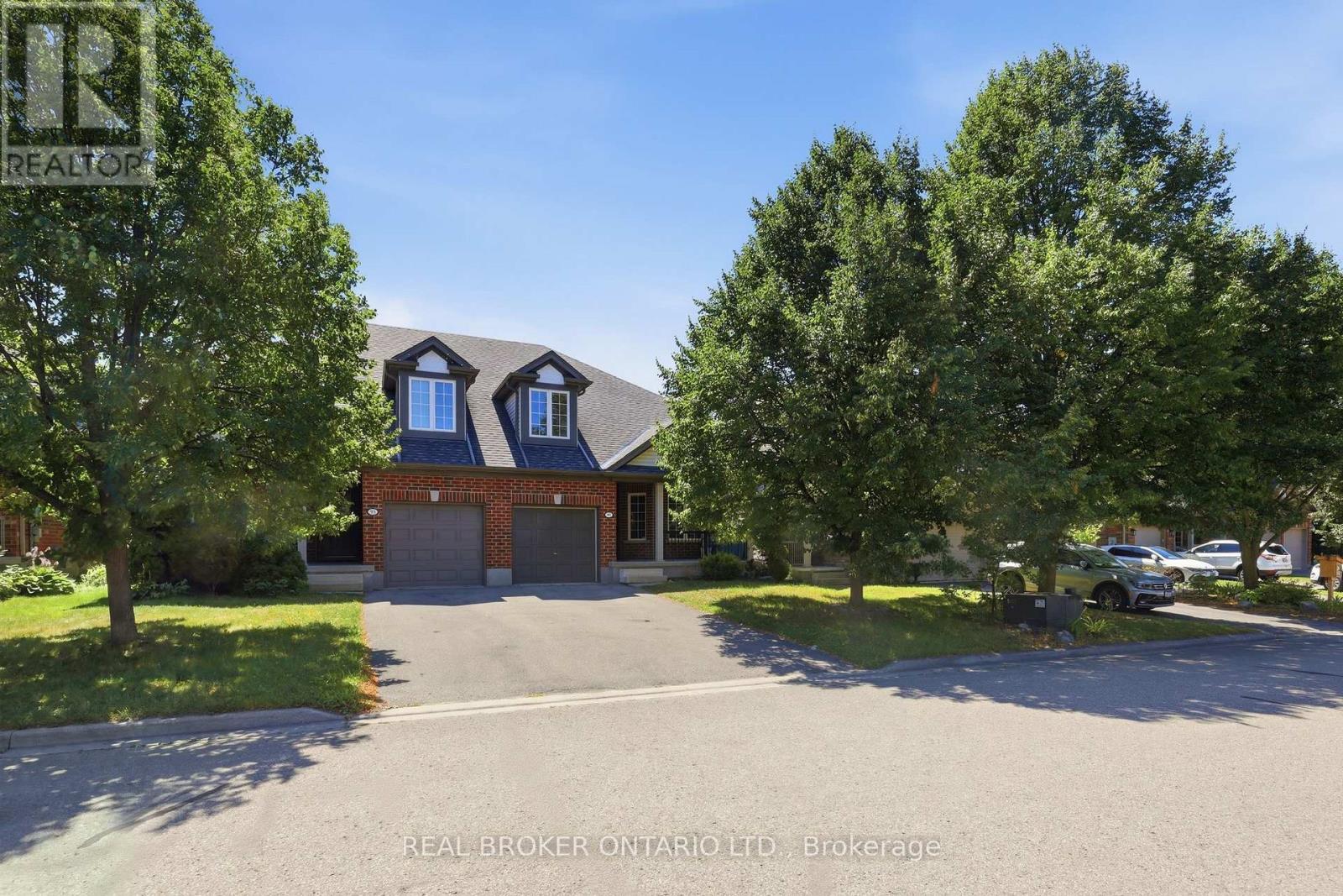 91 Lynch Circle E, Guelph, ON - Outdoor With Facade