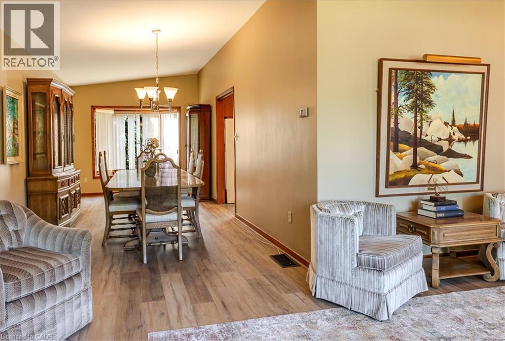 Open concept living space featuring wood-finish flooring throughout - 69 Pleasant Avenue, Hamilton, ON - Indoor