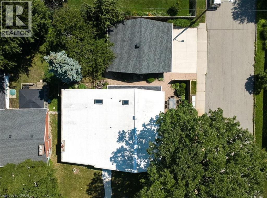 Aerial perspective highlighting two distinct rooflines and mature landscaping - 69 Pleasant Avenue, Hamilton, ON - Outdoor