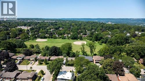 Expansive green space featuring two baseball diamonds surrounded by mature trees - 69 Pleasant Avenue, Hamilton, ON - Outdoor With View