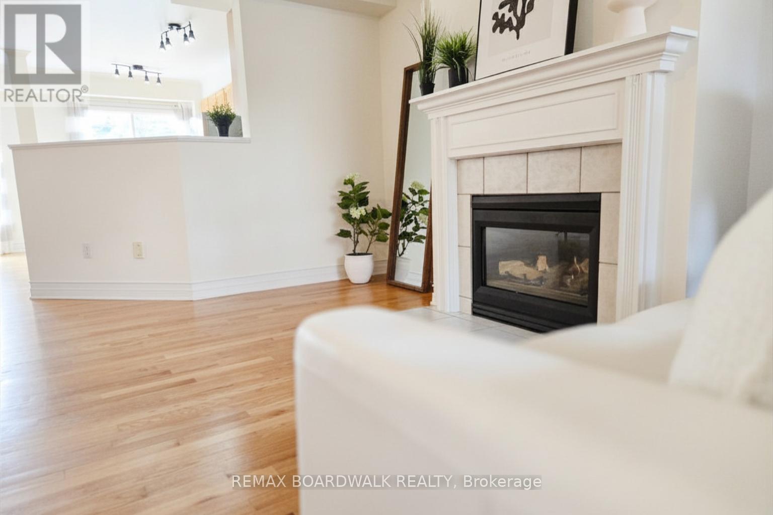 42 College Circle, Ottawa, ON - Indoor Photo Showing Living Room With Fireplace