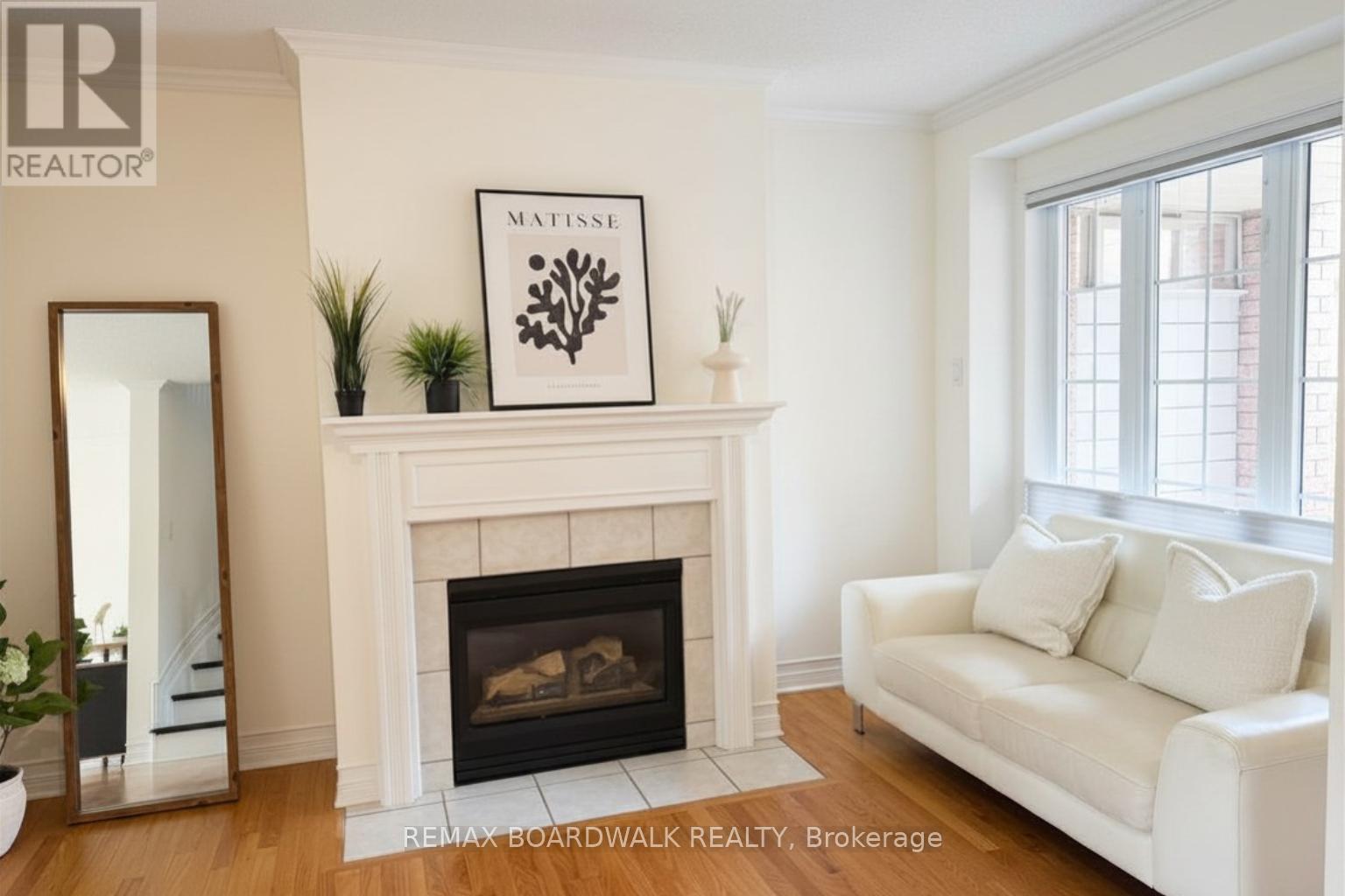 42 College Circle, Ottawa, ON - Indoor Photo Showing Living Room With Fireplace