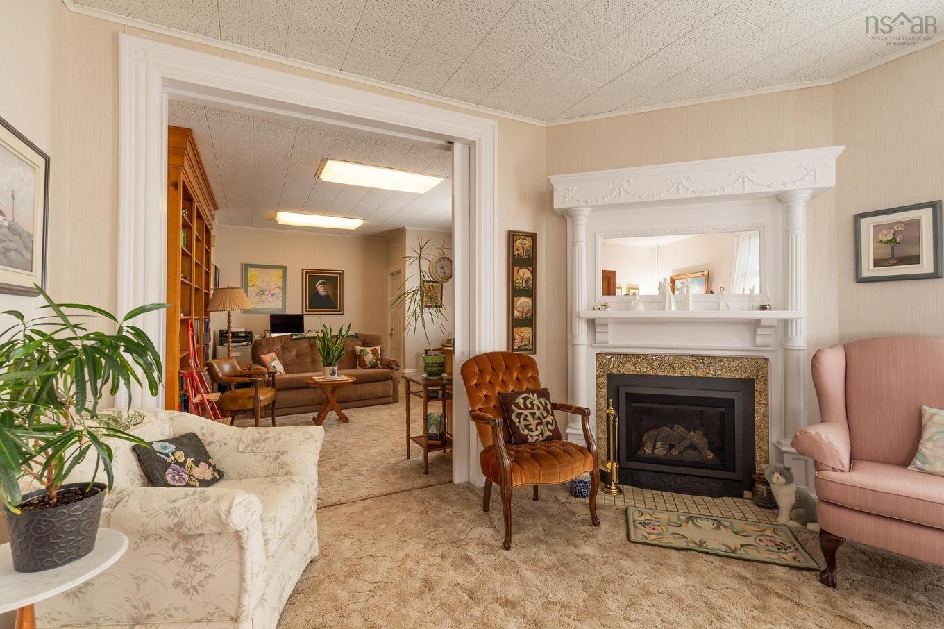 17 Porter Street, Yarmouth, NS - Indoor Photo Showing Living Room With Fireplace