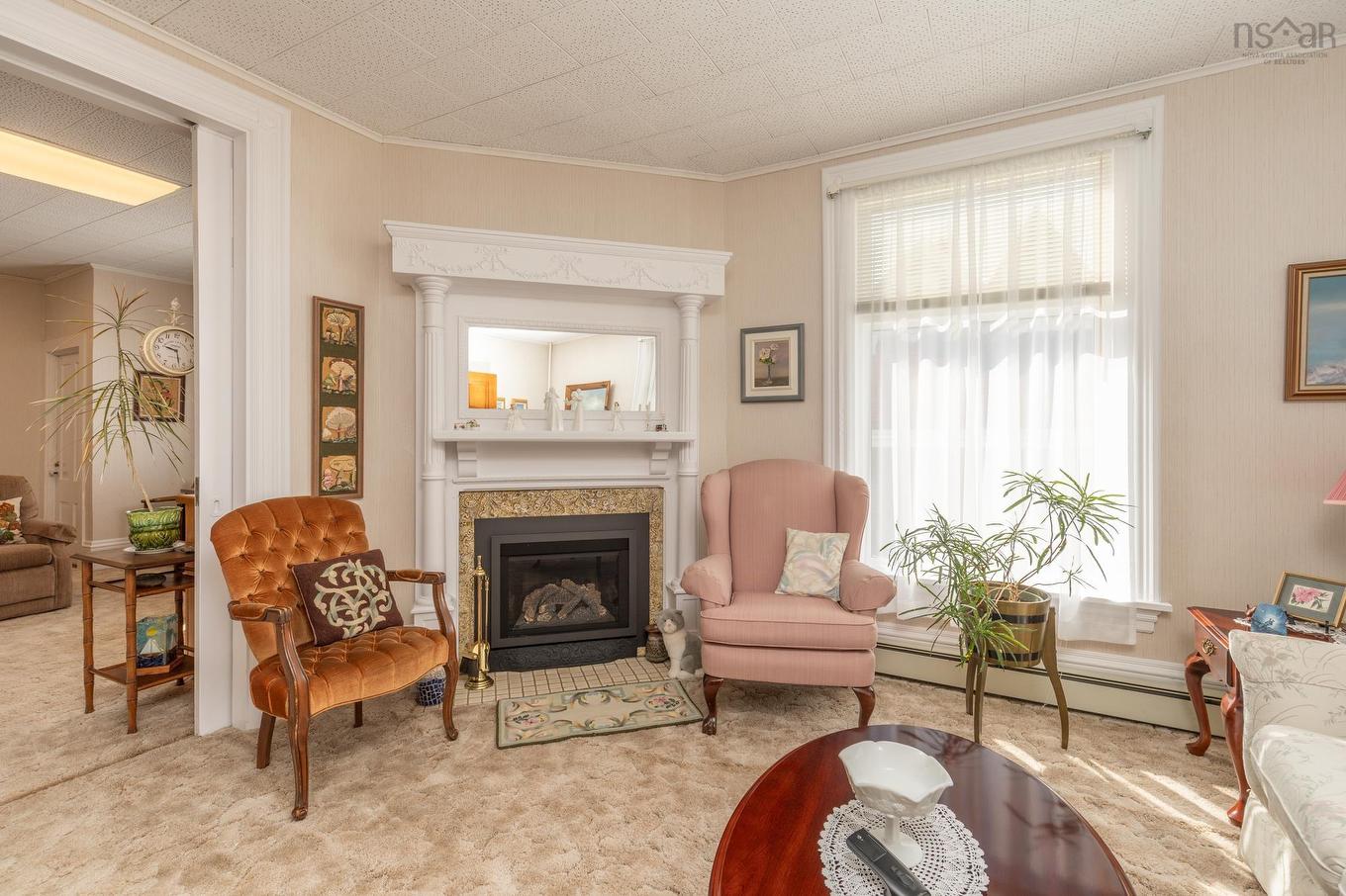 17 Porter Street, Yarmouth, NS - Indoor Photo Showing Living Room With Fireplace