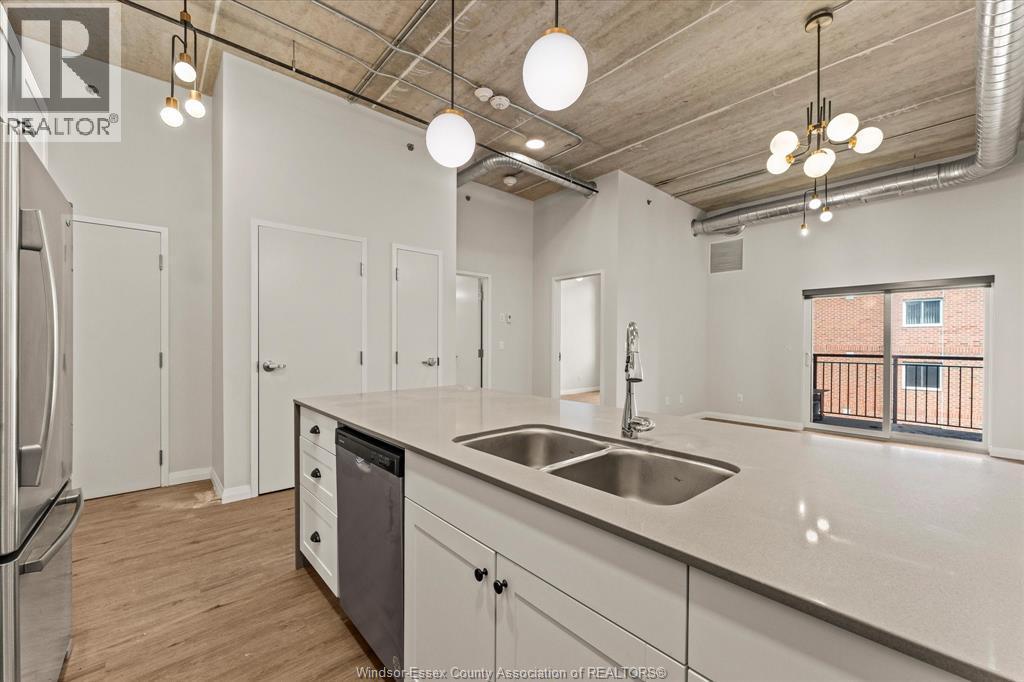 3160 Meadowbrook Lane Unit# 310, Windsor, ON - Indoor Photo Showing Kitchen With Double Sink