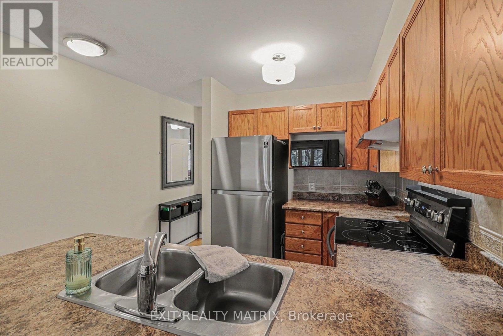 88 Strathaven Private, Ottawa, ON - Indoor Photo Showing Kitchen With Double Sink