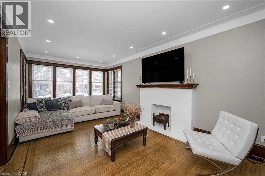 77 Proctor Boulevard, Hamilton, ON - Indoor Photo Showing Living Room With Fireplace