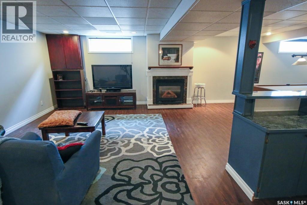 1666 Marshall Crescent, Moose Jaw, SK - Indoor Photo Showing Living Room With Fireplace
