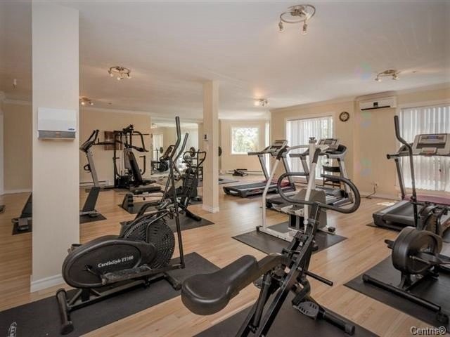 Exercise Room - 1420-7680 Boul. Marie-Victorin, Brossard, QC - Indoor Photo Showing Gym Room