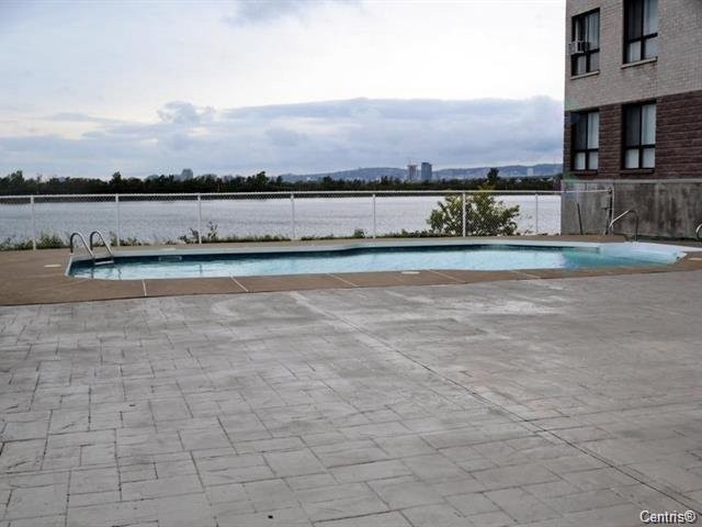 Pool - 1420-7680 Boul. Marie-Victorin, Brossard, QC - Outdoor With In Ground Pool With View