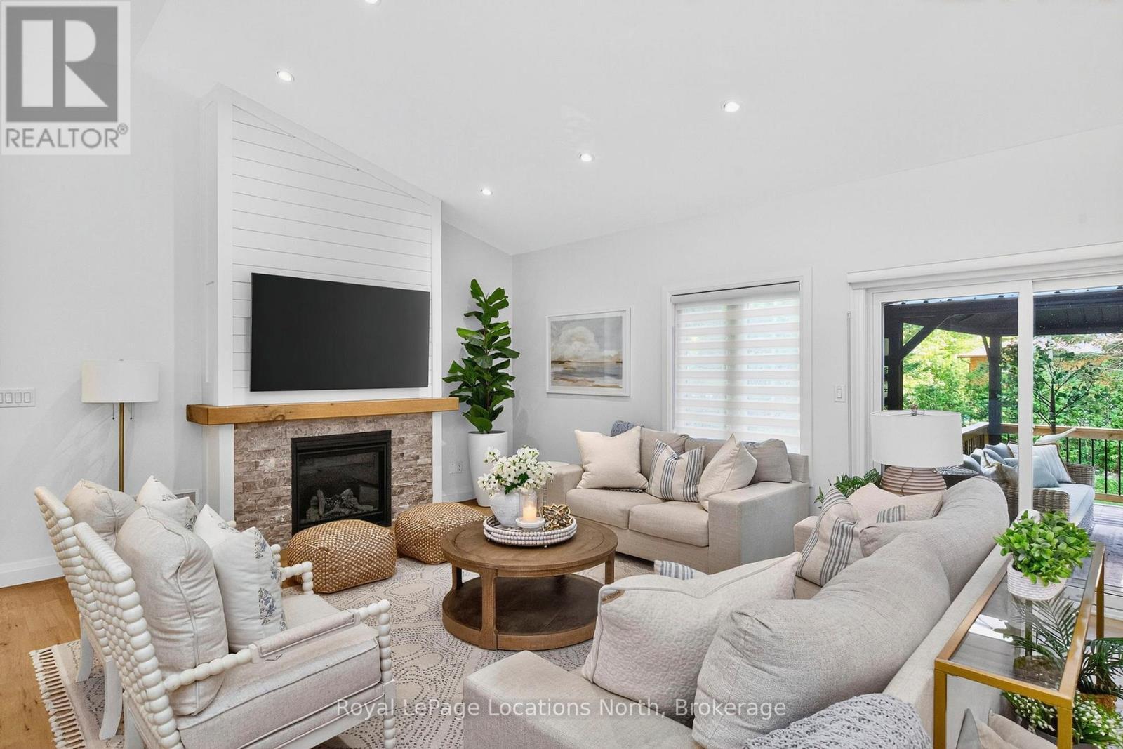 15 Pinecone Avenue, Tiny, ON - Indoor Photo Showing Living Room With Fireplace