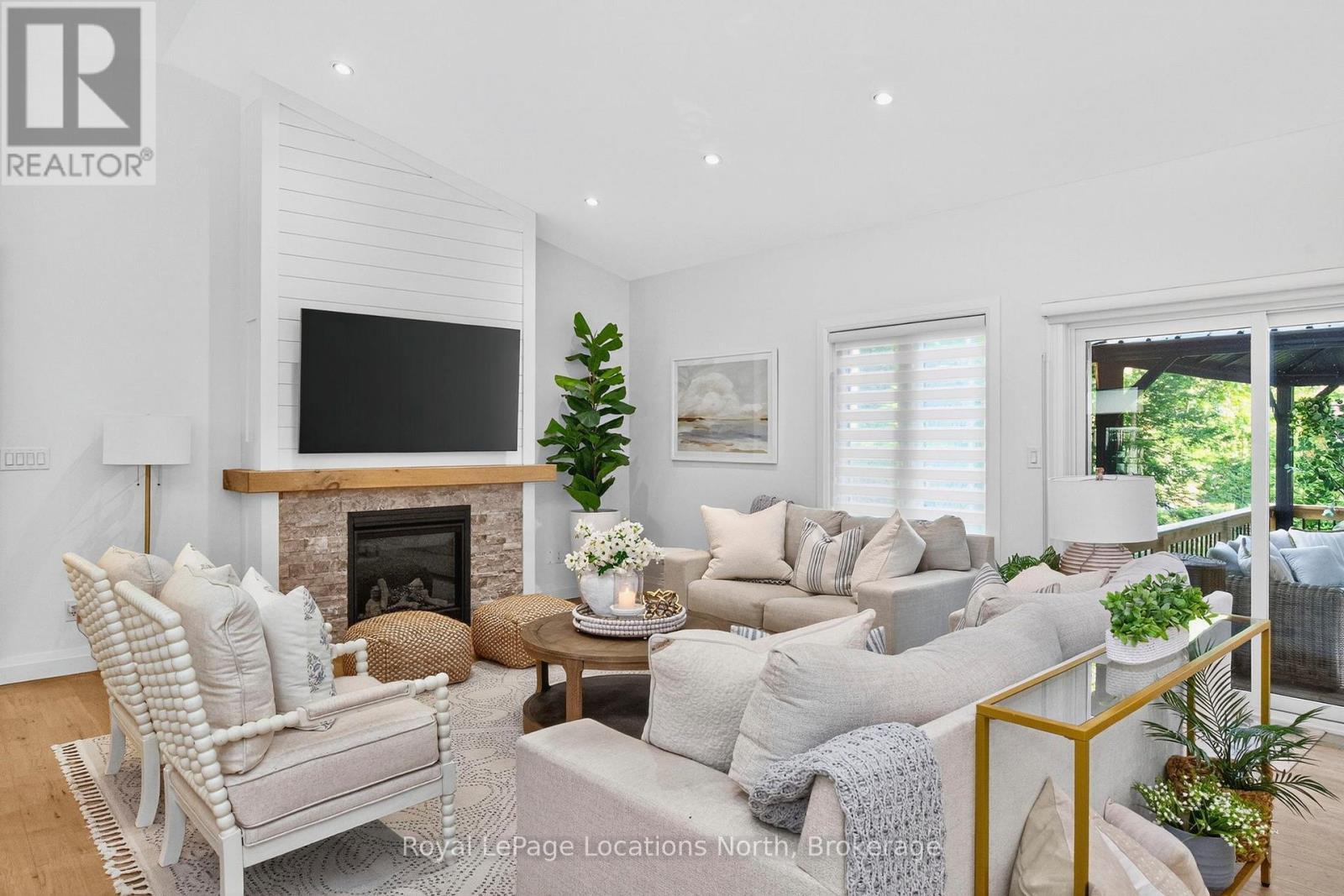 15 Pinecone Avenue, Tiny, ON - Indoor Photo Showing Living Room With Fireplace